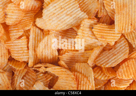 Potato chips colorful abstract background Stock Photo