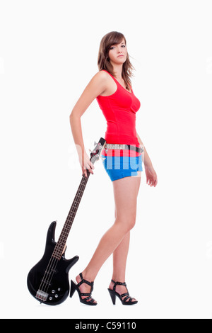 young female bass guitar player in red top - isolated on white Stock Photo