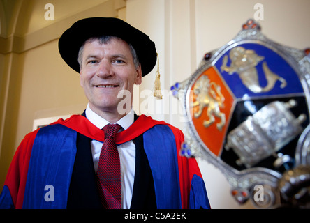 David Gill, chief executive of Manchester United Football Club gets his honorary degree from University of Birmingham, England, Stock Photo