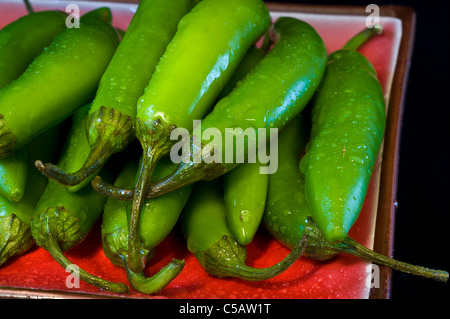 Serrano Peppers are fleshy and meaty with the unique Serrano flavor so popular in Mexican cuisine. Stock Photo