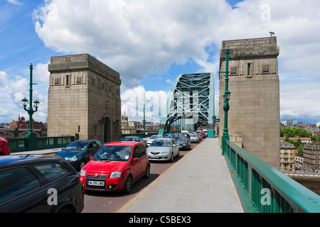 Traffic crossing the Tyne Bridge on the Gateshead side, Newcastle upon Tyne, Tyne and Wear, North East England, UK Stock Photo