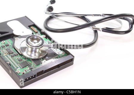 Hard disk with stethoscope on a white background Stock Photo
