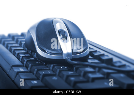 Black mouse on black keyboard Stock Photo