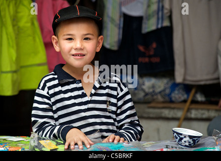 Uzbeki boy, Urgut market, Samarkand, Uzbekistan Stock Photo