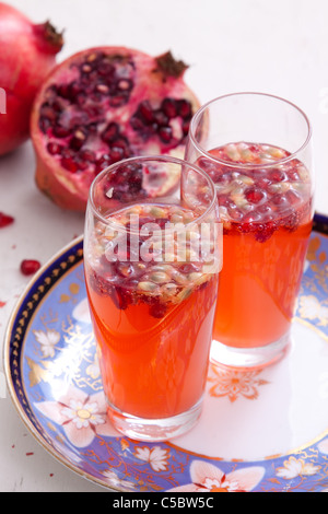 A fresh spritzer made from watermelons, club soda and pomegranate seeds Stock Photo