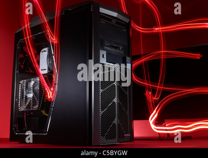 personal computer and monitor with red streaks of light Stock Photo