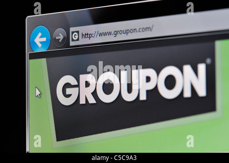 The Groupon Website is displayed on a computer screen. Stock Photo