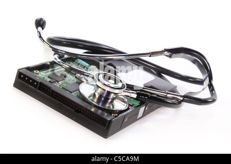 a hard disk and stethoscope on white background Stock Photo