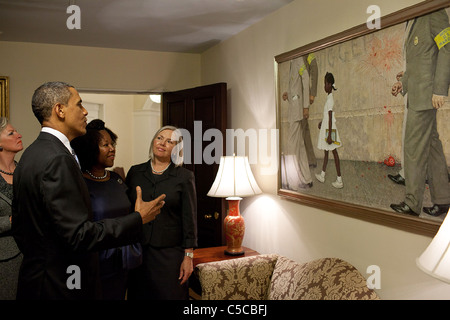 President Barack Obama with Ruby Bridges view a Norman Rockwell painting featuring Ruby as a child. Stock Photo