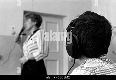 A female teacher working in the classroom at a school for deaf children in Novgorod, Russia Stock Photo
