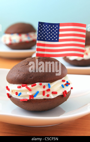 All American Whoopie Pie Dessert Decorated with a USA Flag and Red, White and Blue Sprinkles Stock Photo