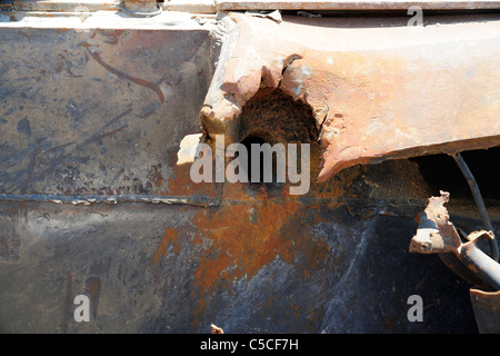 a blow up, destroyed T54 Libya tank in the desert Stock Photo