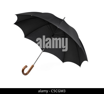 Black vintage umbrella isolated on white with some natural shadows. Stock Photo