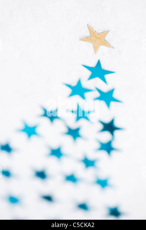 Shooting stars on snow pattern Stock Photo