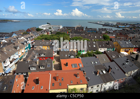 city with harbour on island Heligoland (Helgoland) and the island 'The Dune' ('Die Düne') in the background Stock Photo