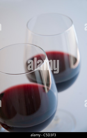 Two glasses of red wine. Close view. Stock Photo