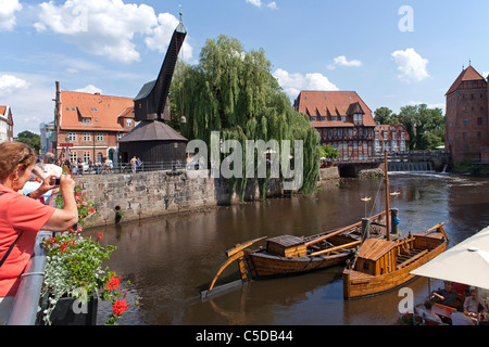old harbour with the old crane and historic boats, Lueneburg, Lower Saxony, Germany Stock Photo