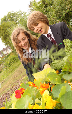 School pupils in secondary school garden project Stock Photo