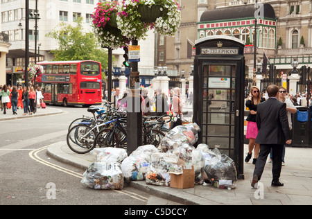 Piles of rubbish, Duncannon street, Trafalgar Square London UK Stock Photo