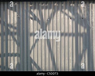 Shadow of High voltage electricity cable, lines & masts transmission tower, resistors, transformers, energy power line Stock Photo