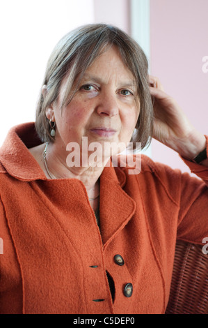 Middle aged woman looking at the camera Stock Photo