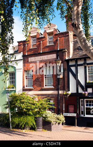 GREENHITHE, KENT, UK - JUNE 26, 2011:   Exterior view of a pretty house called 'Ye Village Club' in the High Street Stock Photo