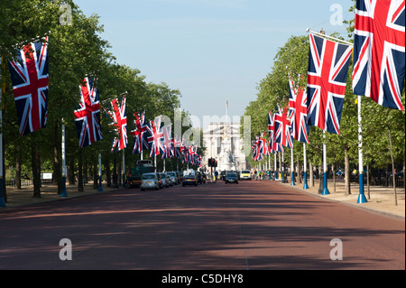 Union Jack flags lining the Mall towards Buckingham Palace for state occasion, London, UK Stock Photo