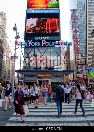 The New York Police Department maintains a visible presence in Times Square, Manhattan, with a large facility and a neon sign. Stock Photo