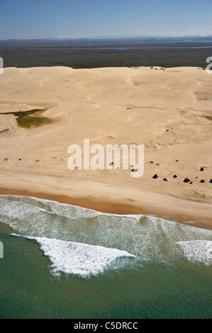 Aerial view of a Four Wheel Drive Vehicle on Stockton Beach, Newcastle, New South Wales, Australia - aerial Stock Photo