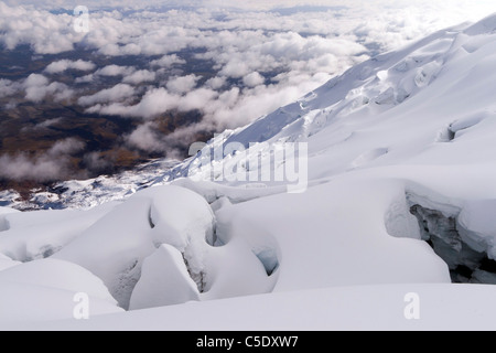 Cotopaxi volcano in Ecuador Andes, view from the slopes of clouds and crevasses on the glacier Stock Photo