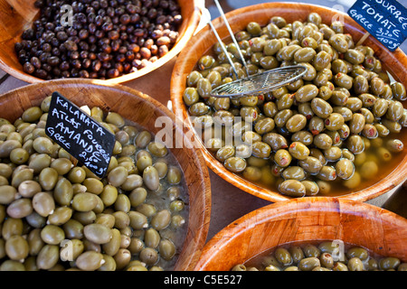 Olives for sale in street market stall, France. Stock Photo