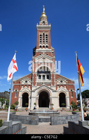 The tower of the Basilica of Notre Dame de Brebières in the Somme Picardy town of Albert, France Stock Photo