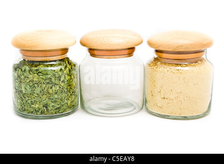Three glass cans with spices Stock Photo