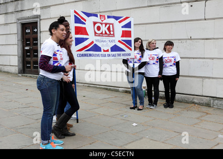 THE ROYAL WEDDING DAY 2011, viewed at Duke of York steps by The Mall are staff of OK celebrity magazine offering congratulations. Stock Photo