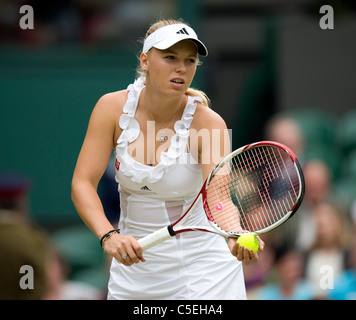 Caroline Wozniacki (DEN) in action during the 2011 Wimbledon Tennis Championships Stock Photo