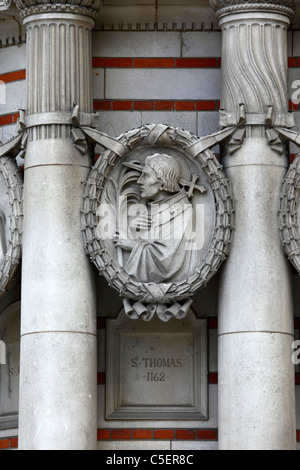 Portrait of Saint Thomas of Canterbury on west facade of the Metropolitan Cathedral , Westminster, London, England Stock Photo