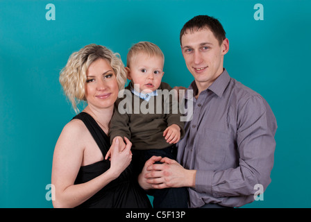 Portrait of a happy family expecting a new baby Stock Photo