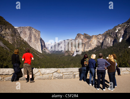 Visitors enjoy the grand view of Yosemite Valley from Tunnel View overlook Stock Photo