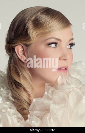 Beautiful young woman looking away Stock Photo