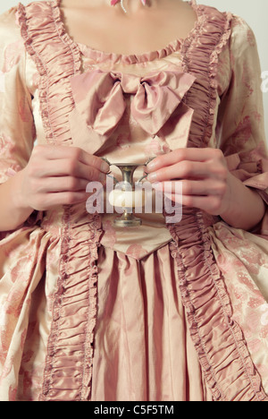 Closeup of a Victorian woman holding a chalice Stock Photo