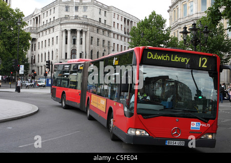 A bendy bus traveling in London Stock Photo