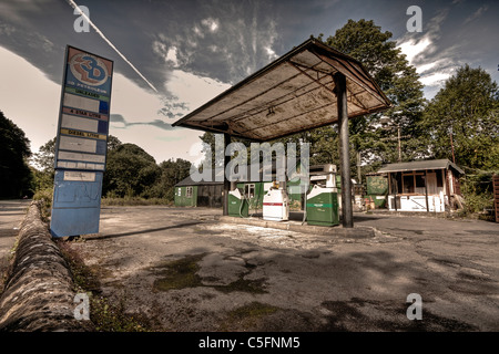 A disused and derelict petrol station, showing signs of disrepair. Stock Photo