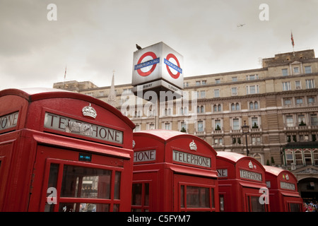 Red telephone boxes outside Charing Cross station, London UK Stock Photo