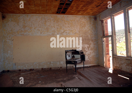 An old stove sits in an abandoned school house in Cuervo, New Mexico. Stock Photo