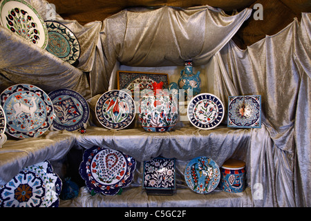 Hand painted authentic Armenian ceramics and pottery for sale at an Armenian tile workshop East Jerusalem Israel Stock Photo