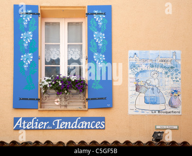 Beautifully decorated blue shutters and window display, Fayence, Provence, France Stock Photo