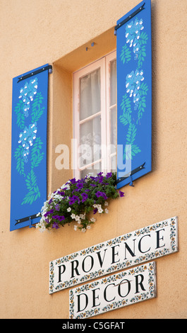 Beautifully decorated blue shutters and window display, Fayence, Provence, France Stock Photo