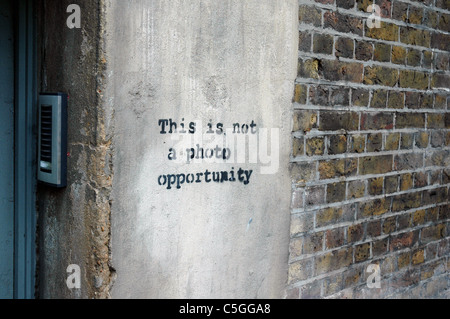 THIS IS NOT A PHOTO OPPORTUNITY Banksy Street Art, London England 