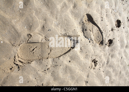 Boot marks in the sand Stock Photo