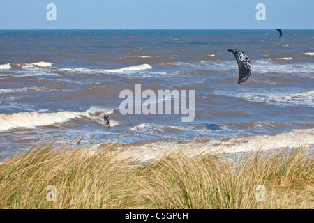 Kite surfing at Sea Palling on the Norfolk Coast Stock Photo